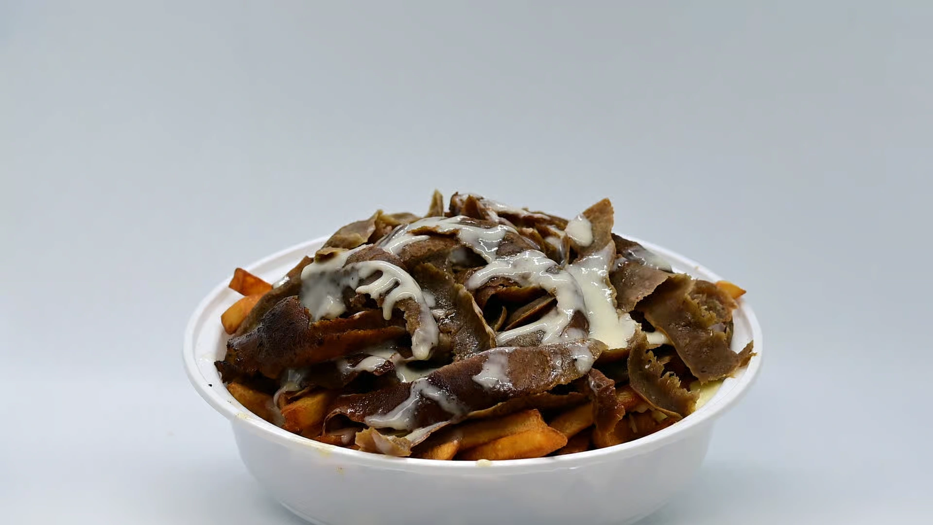 Beef shawarma wrap with garlic sauce at Eat and Dip Edmonton